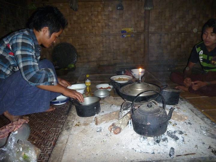 Doon Ding preparing dinner, in this case the kitchen was attached to the house, and on the upper level.